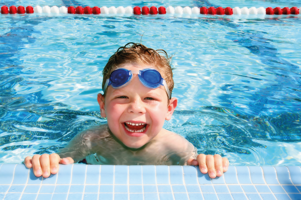 Happy child in a swimming pool-4c